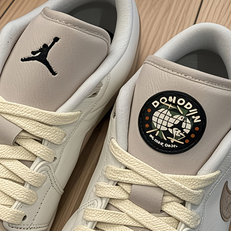 Jordan Air Jordan 1 Low Dongdan Men's Low - top Retro Basketball Shoes. Soft and comfortable, with excellent slip - resistance and wear - resistance. In white and brown colorway, Style Code: IB8855 - 121